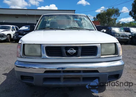 1999 Nissan Frontier Xe z USA, uszkodzony, nr VIN 1N6DD21S8XC318584